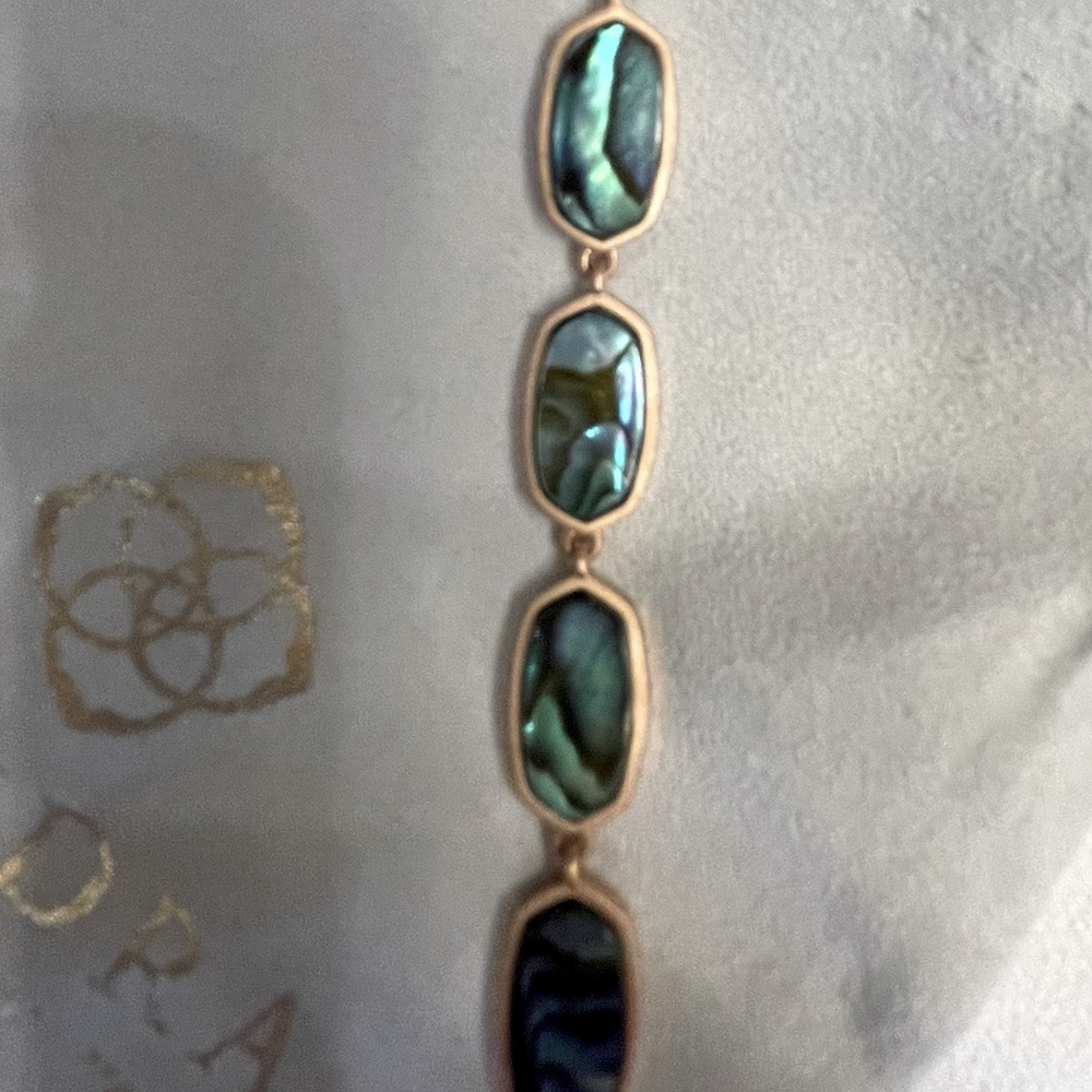 Kendra Scott abalone shell bracelet.